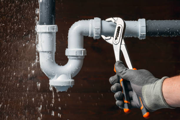 Professional Emergency Plumber technician working in Van Meter, IA